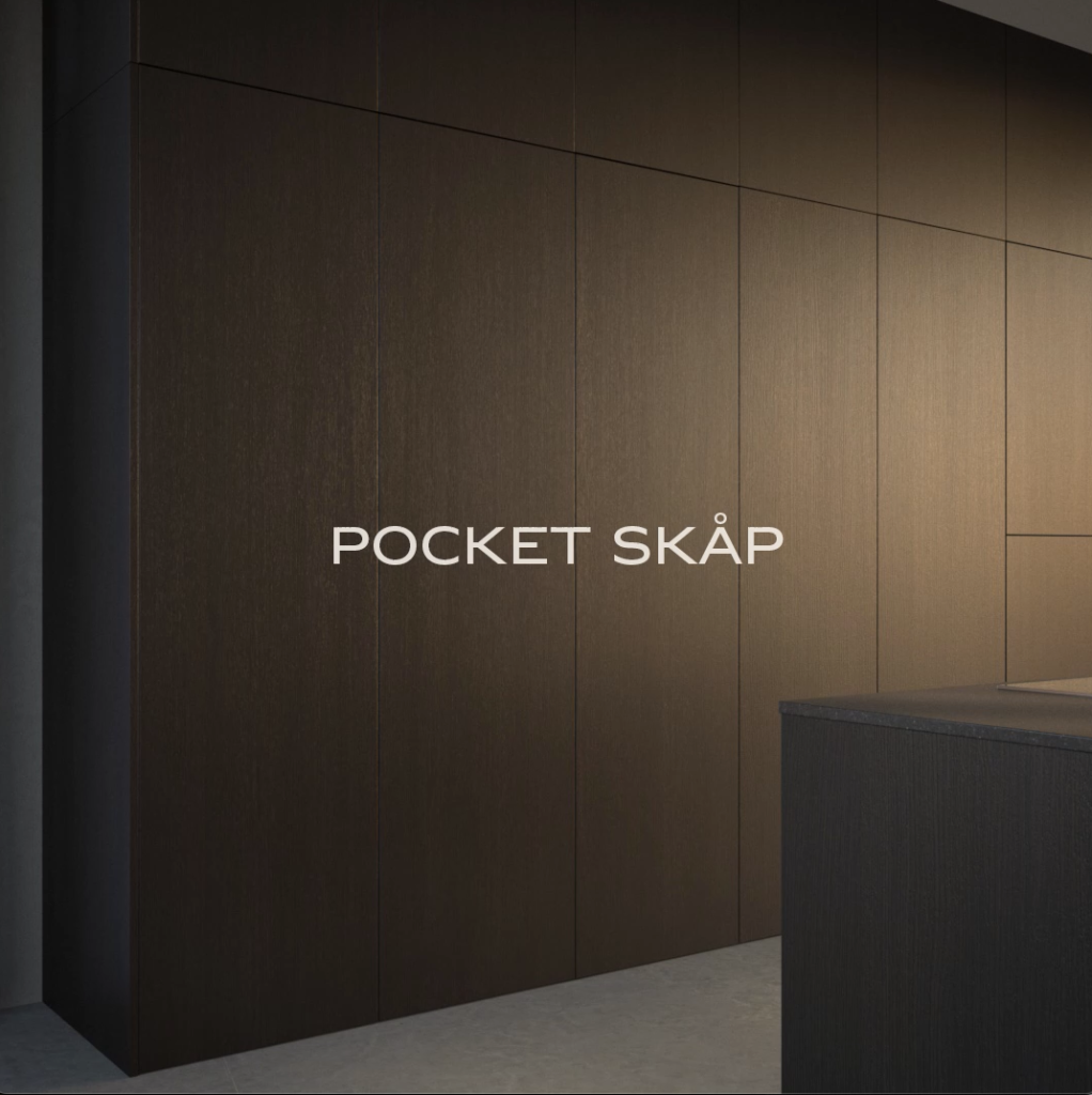 Stiligt - Mörka träskåp märkta "POCKET SKÅP" ger en stilig touch till det moderna, minimalistiska rummet.