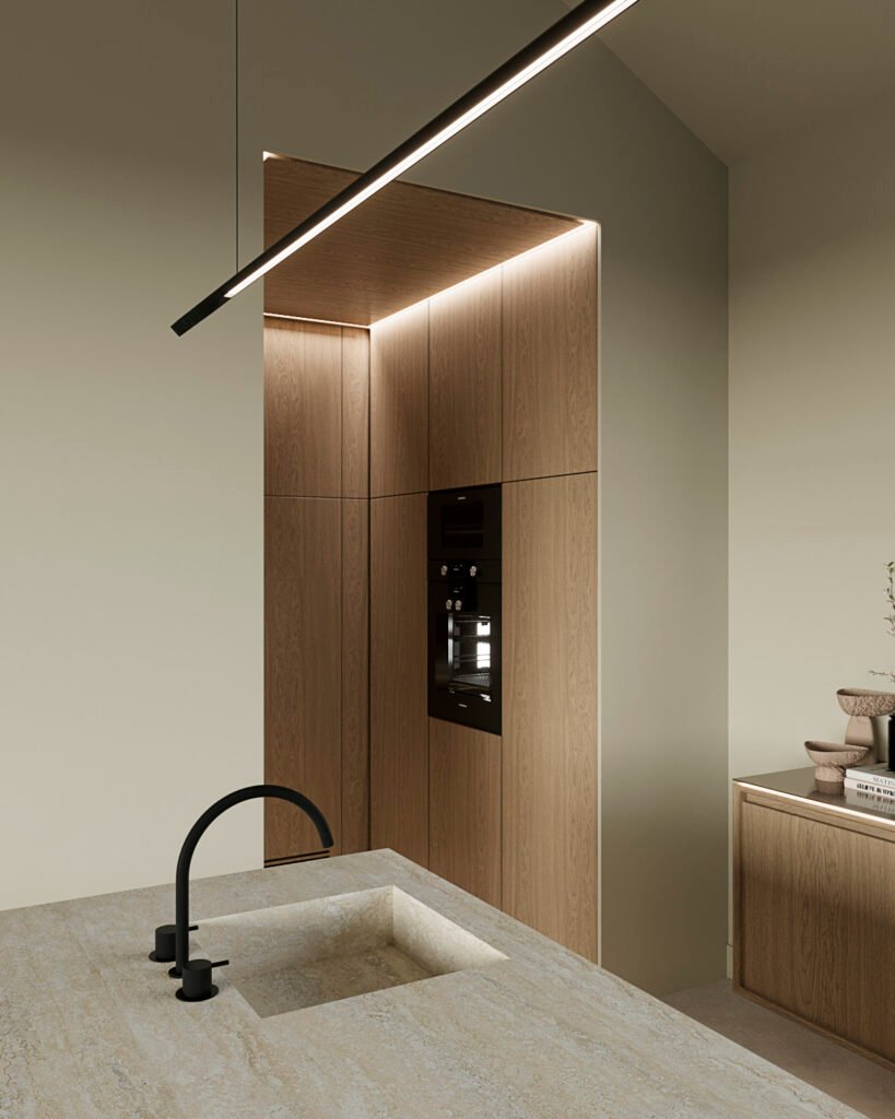 Stiligt - Minimalistiskt kök med skåp i ljust trä, inbyggda svarta vitvaror, bänkskiva i sten och en mattsvart kran på en ö under en linjär pendellampa. Hur du designar ett kök som både är vackert och praktiskt: Ultimata tips!